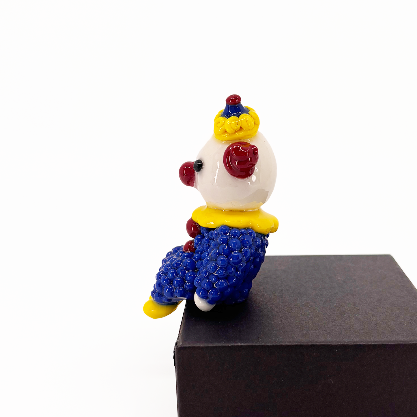 Sitting Clown Figurine